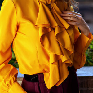 Blusa con adornos, volantes, de grandes diseñadores